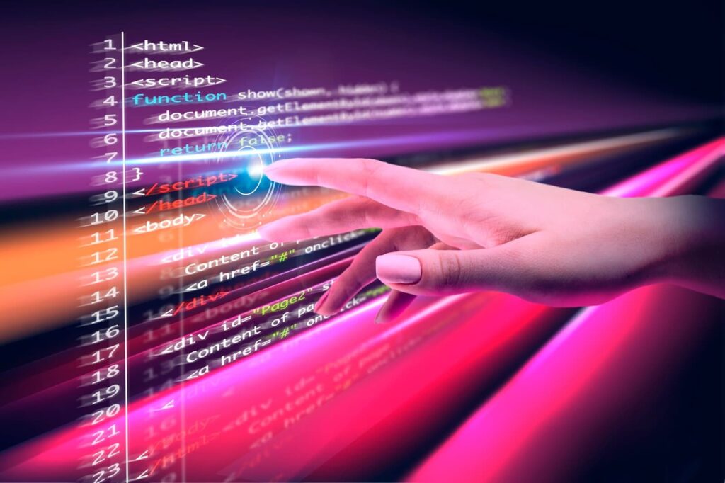 Hand touches program code